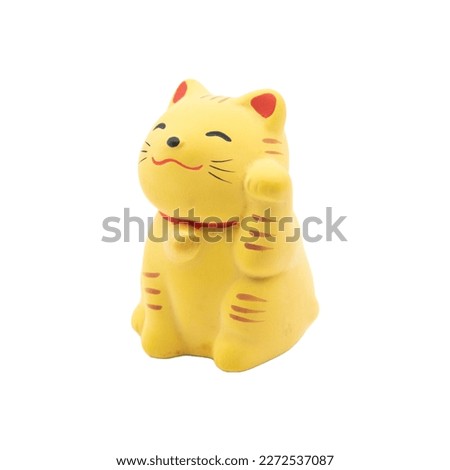 Maneki-neko money cat or prosperity cat isolated on white background  is a symbol of good luck, prosperity and good fortune. Royalty-Free Stock Photo #2272537087