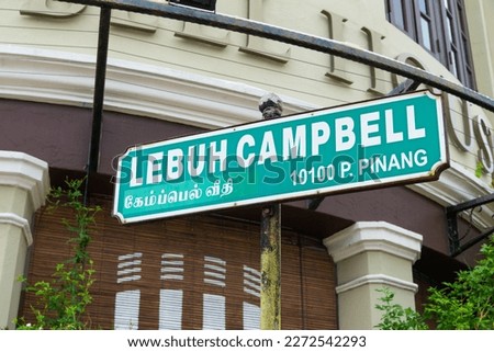 Campbell Street street sign in George Town, Penang, Malaysia with surrounding building as background.
