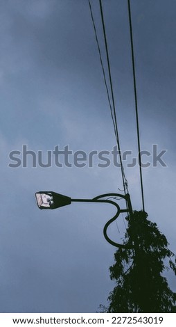Tall electricity poles in the countryside