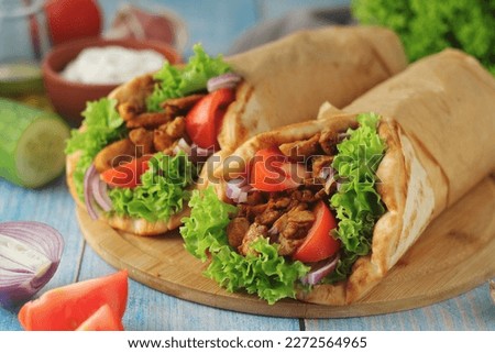 A traditional dish of Greece - gyros Royalty-Free Stock Photo #2272564965