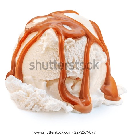 Scoop of vanilla ice cream ball with caramel toffee sauce isolated on white background