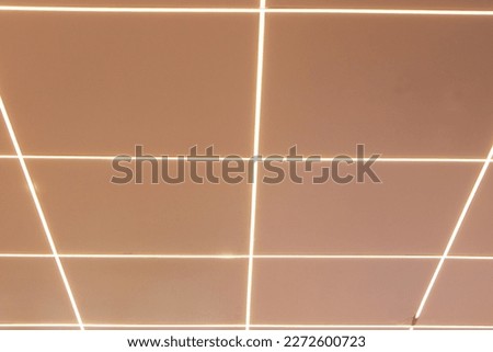 Office Ceiling brown. Light on edge of square ceiling. Plasterboard ceiling is most popular ceiling system today. Both residential houses, rooms, hotels or various places with smoothness. Look modern.