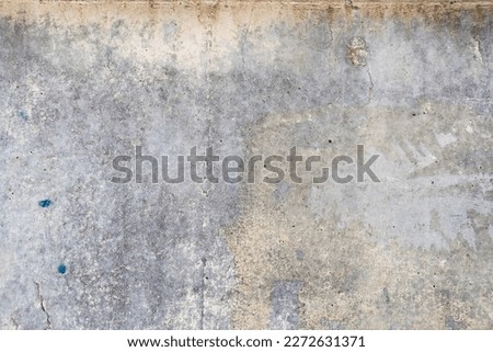 Dirty wall texture. Grunge concrete texture. Cracks and chips on the wall.