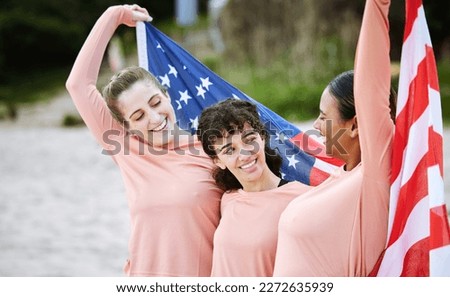 Volleyball woman, team and american flag at beach, happiness and pride for celebration, winning or goal. Women, sports and diversity with support, solidarity or teamwork for winner with excited smile