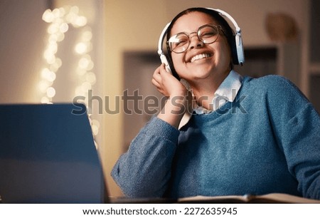 Student, music headphones and woman in home at night streaming radio or podcast after elearning. Freelancer, remote worker or happy business female listening or enjoying audio, song or album in house