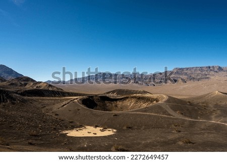 Wide Shot of The Top of Little Hebe Crater and Surrounding Mountains in Death Valley