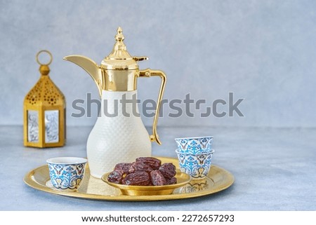 Traditional arabic coffee with dates . Ramadan decor with Arabian coffee set	                               Royalty-Free Stock Photo #2272657293