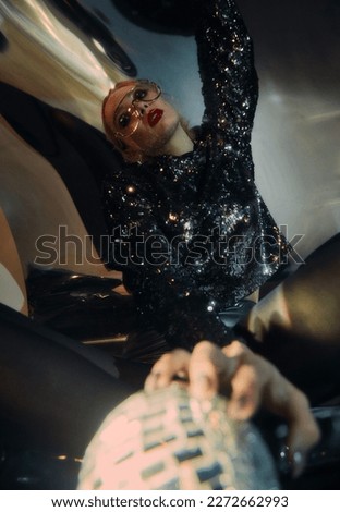 "Sleep Paralysis" Fashion Art studio photoshoot with specific lighting Royalty-Free Stock Photo #2272662993
