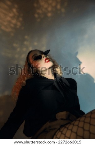 "Sleep Paralysis" Fashion Art studio photoshoot with specific lighting Royalty-Free Stock Photo #2272663015