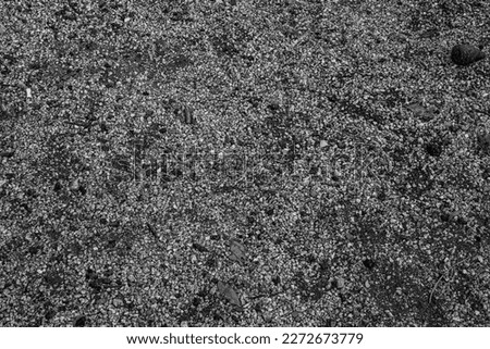 Background from small gravels, top view. Construction gravel texture for publication, design, poster, calendar, post, screensaver, wallpaper, postcard, cover, website. Gray toned high quality photo
