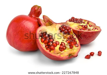 Whole, half and seeds of pomegranate isolated on white background for package design.