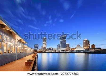 Milwaukee, Wisconsin, USA skyline on the lake at night.