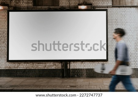 Blank city billboard sign on a wall Royalty-Free Stock Photo #2272747737