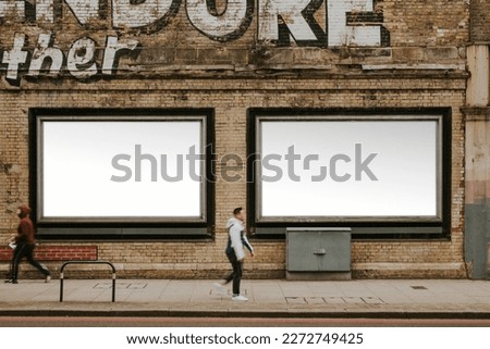 Billboard with design space by the street of London, high quality image