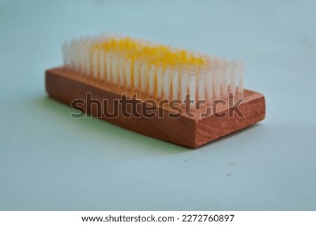 brush for washing clothes made of wood and soft bristles