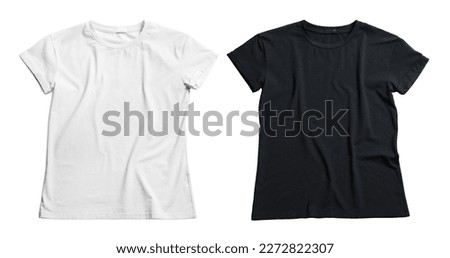 Stylish t-shirts on white background, top view