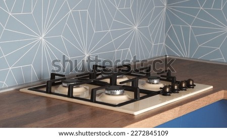 Modern gas cooktop in kitchen. Cooking appliance Royalty-Free Stock Photo #2272845109