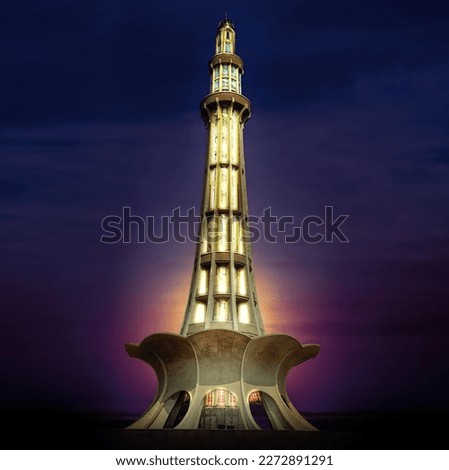 Lahore, Pakistan Minar-e-Pakistan dramatic dark clouds in monument background. Royalty-Free Stock Photo #2272891291