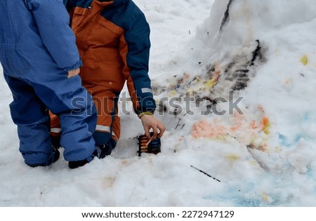 winter art education can also take place in snow. dots can be made on the igloo with watercolors. snow melts, colored spots dissolve and stretch. children and preschoolers draw with a brush, picture