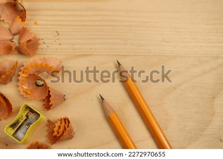 Pencil Sharpener on Wooden Background 