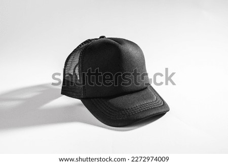 Trucker cap, snapback, all black, black mesh. Isolated on white. Mock-up for branding Royalty-Free Stock Photo #2272974009