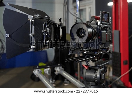 professional movie camera assembly with 35mm lens installed