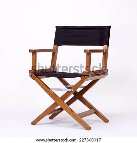 Director's Chair in Film Industry, Isolated on White background with Real Shadow Royalty-Free Stock Photo #227300017