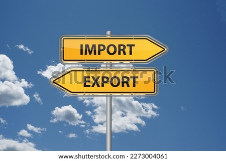 Import export buttons onyellow arrows in front of blue sky - trade 