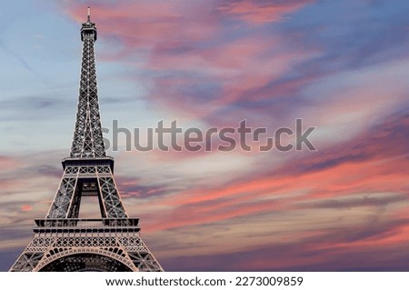  Eiffel Tower against the background of a beautiful sky at sunset. Paris, France 