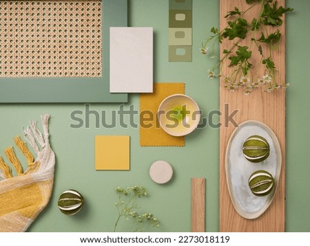 Elegant  flat lay composition in green and yellow color palette with textile and paint samples, lamella panels and tiles. Architect and interior designer moodboard. Top view. Copy space. 