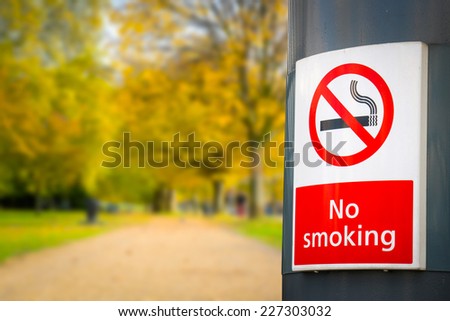 no smoking board & sign in the park