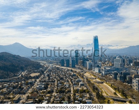 The Costanera Center building in Santiago, Chile, stands tall in this drone picture with the Los Andes mountains as a stunning backdrop.