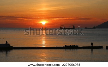 Photo of a beautiful sunset on the Black Sea on a spring day