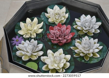 Colorful water lily flowers made of stone, which look very beautiful. We see this in Shalban Buddhist Vihara in Comilla Bangladesh.