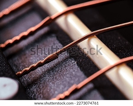 closeup macro picture of Guitar strings 