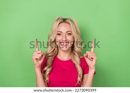 Photo cadre of confident promo adorable nice lady blonde wavy hair direct fingers up presentation modern product isolated on green color background