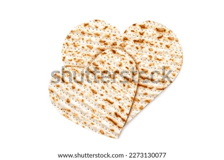 Matzah in the form of a heart. Pesach celebration concept (jewish Passover holiday) Royalty-Free Stock Photo #2273130077