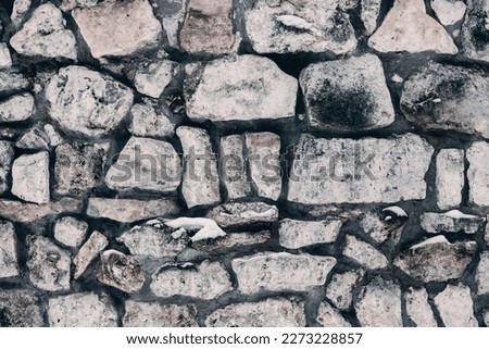 Stone rock wall for background and texture