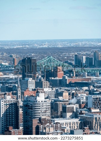 Montreal city scape with a focus on Jacques Cartier Bridge on a winter morning