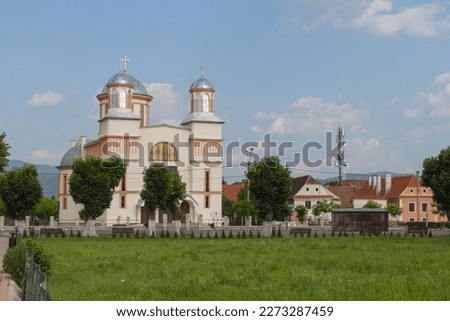 View of the Church of the Three Saints (Biserica Sfinţii Trei Ierarhi) on a sunny day in the city of Prejmer, Brașov,Transylvanian Saxon, Romania