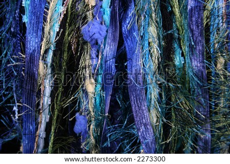 fiber background in various shades of blue and green