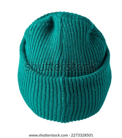 green hat  knitted isolated on white background. warm winter accessory