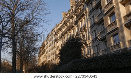 Facade of Parisian buildings, Gothic and old, more or less lit by the Sun, beautiful houses and buildings, urban area magnified by the lighting of the sun, even a little in the shade, magical atmosph