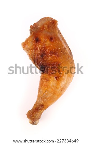 Roast chicken leg isolated on white background.