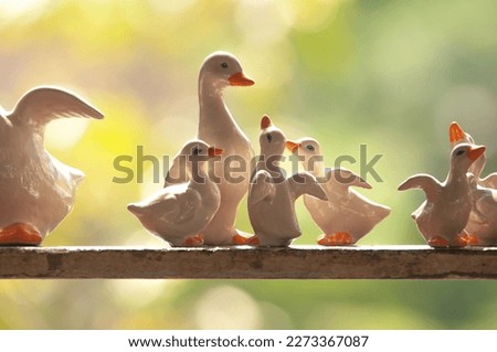 ceramic
The type of ornamental as the picture A family of geese living together is a symbol of family warmth.