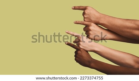Mockup, hands and group of people in studio with answer, gesture or sign against yellow background. Finger, direction and emoji hand showing solution, faq or about us, vote or opinion while isolated Royalty-Free Stock Photo #2273374755