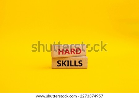 Hard skills symbol. Wooden blocks with words Hard skills. Beautiful yellow background. Business and Hard skills concept. Copy space. Royalty-Free Stock Photo #2273374957
