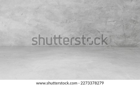 Empty grey cement wall room interior studio with rough and floor well display products and text presentation on free space backdrop