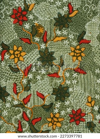 Hand Drawn Indonesian Batik with Floral Design, Made in Indonesia, Full Batik Tulis Madura, Indonesian Batik Fabric Royalty-Free Stock Photo #2273397781