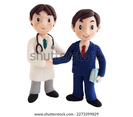 A doctor and a businessman shake hands.(This is a photo of a clay work)